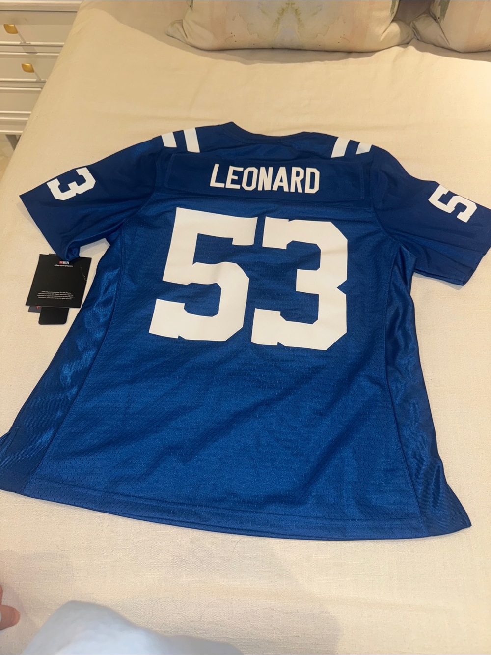 NFL Blue and White V-Neck Football Jersey with Embroidered Shield